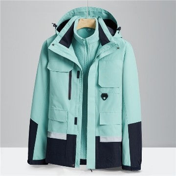 Light blue and black jacket with multiple pockets