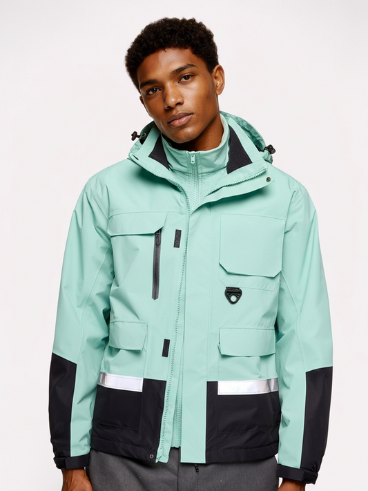 Person wearing a light blue jacket with black accents