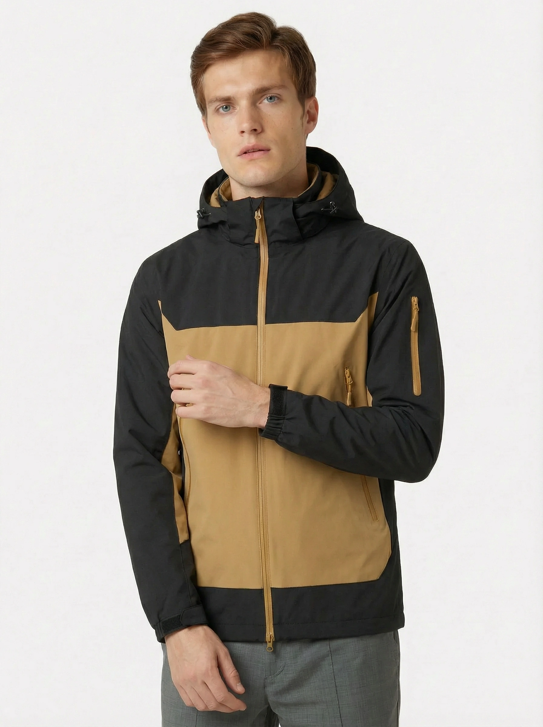 Man wearing a black and brown jacket 