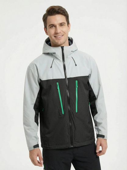 Man wearing a gray and black jacket with green zippers