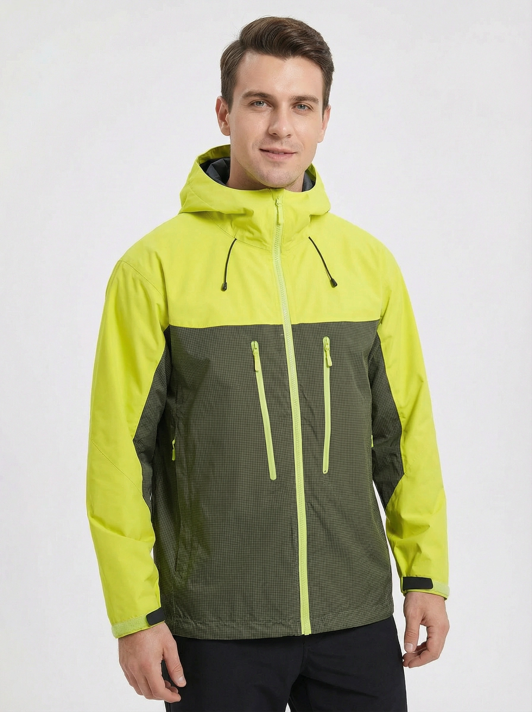 Man wearing a two-tone green and black jacket