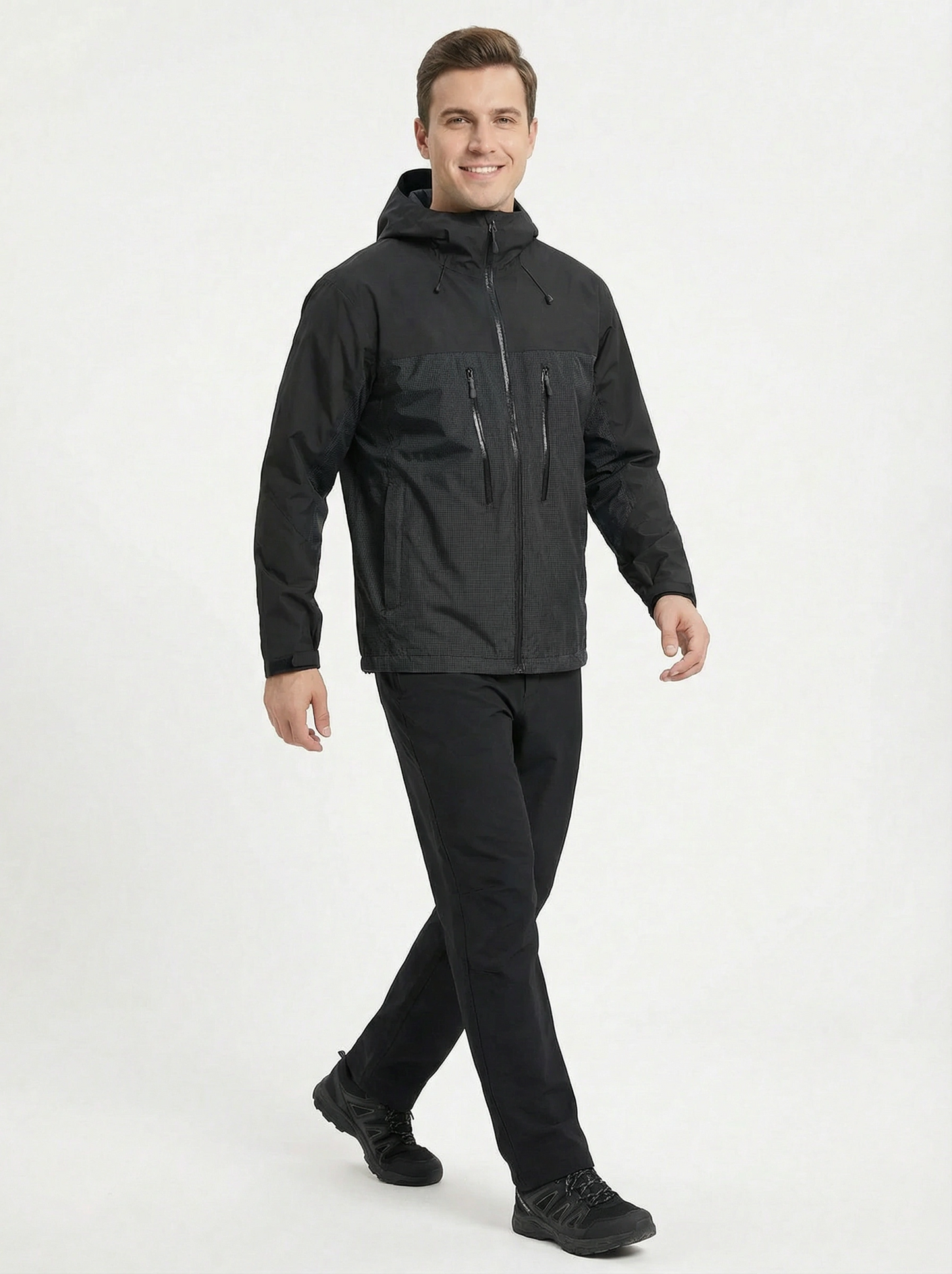 Man wearing a black jacket and pants