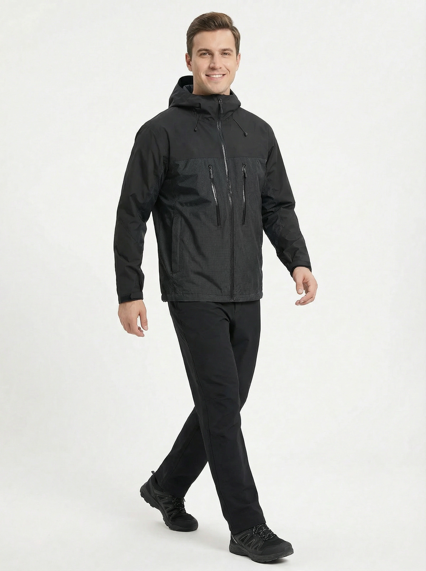 Man wearing a black jacket and pants