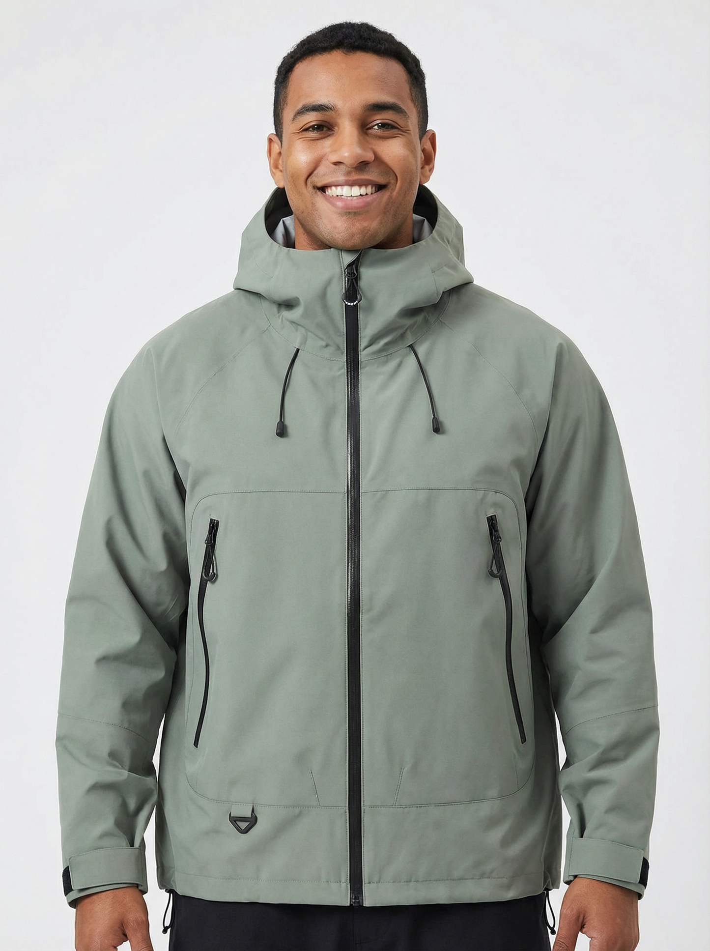 Man wearing a green jacket with a hood