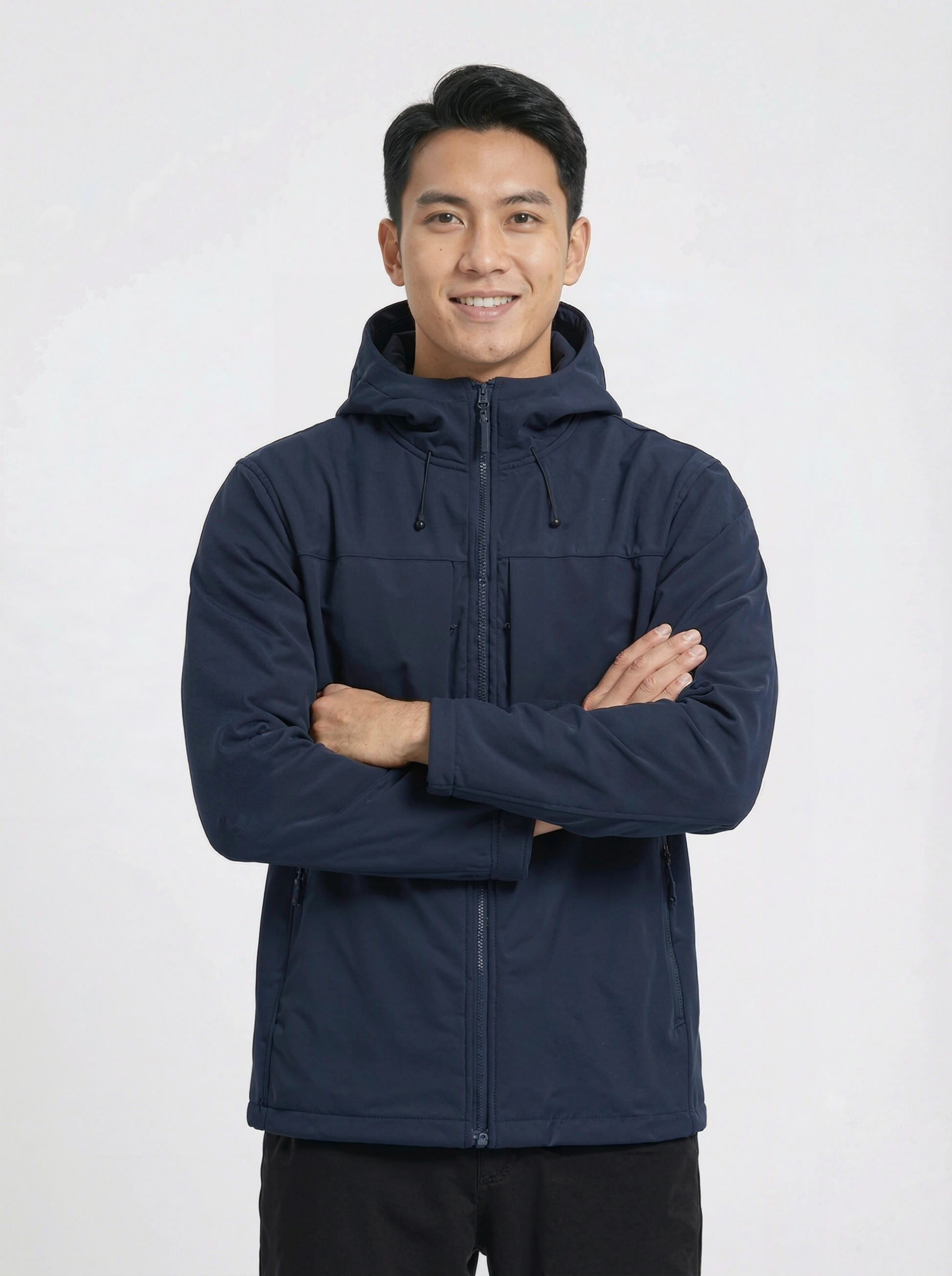 Man wearing a navy blue jacket with a hood