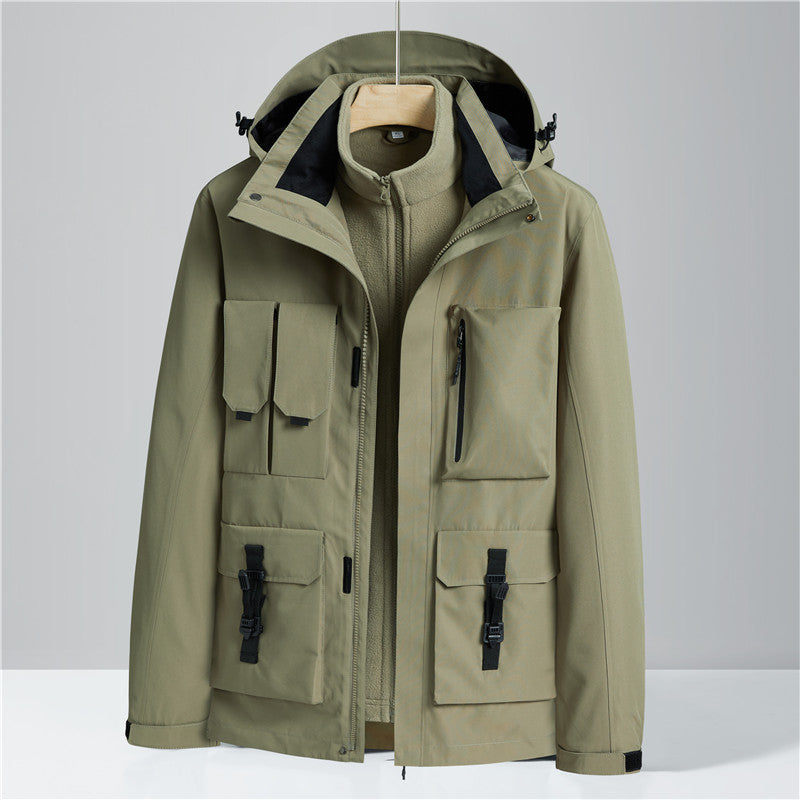 Green jacket with multiple pockets and zippers