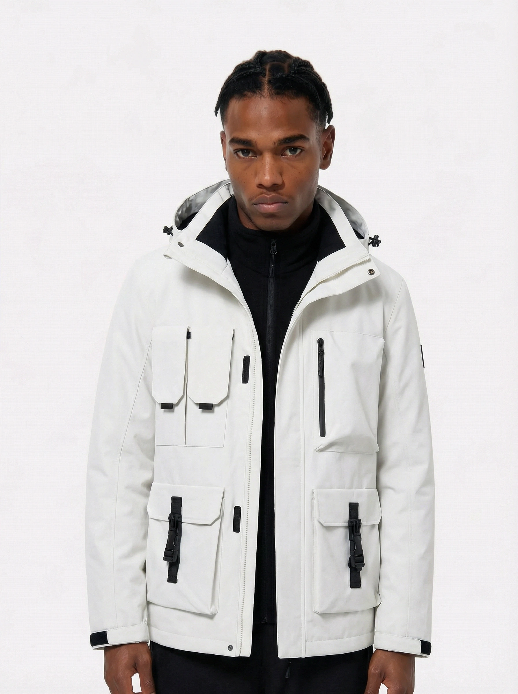 Man wearing a white jacket with black accents 